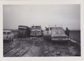 2 trucks & 2 cars & us were stranded in the mud on our way to Alice Springs 1963 May